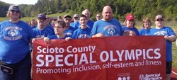 Athletes carry the Scioto County Special Olympics Banner at the Rio Grande Track Meet April 28, 2017.