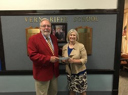 William Carson, Portsmouth Elks Lodge exalted ruler (left), presented a check for $5,000 from the Elks to Vern Riffe School, accepted by Director of School Programs Dr. Tammy Guthrie (right).