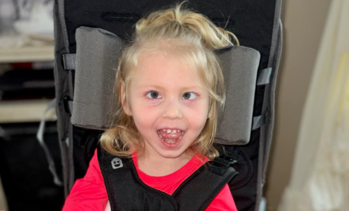 Madelyn, child of Chelsea & C.J Adkins, is trying out the Special Tomato Out & About Seat for the first time. 
