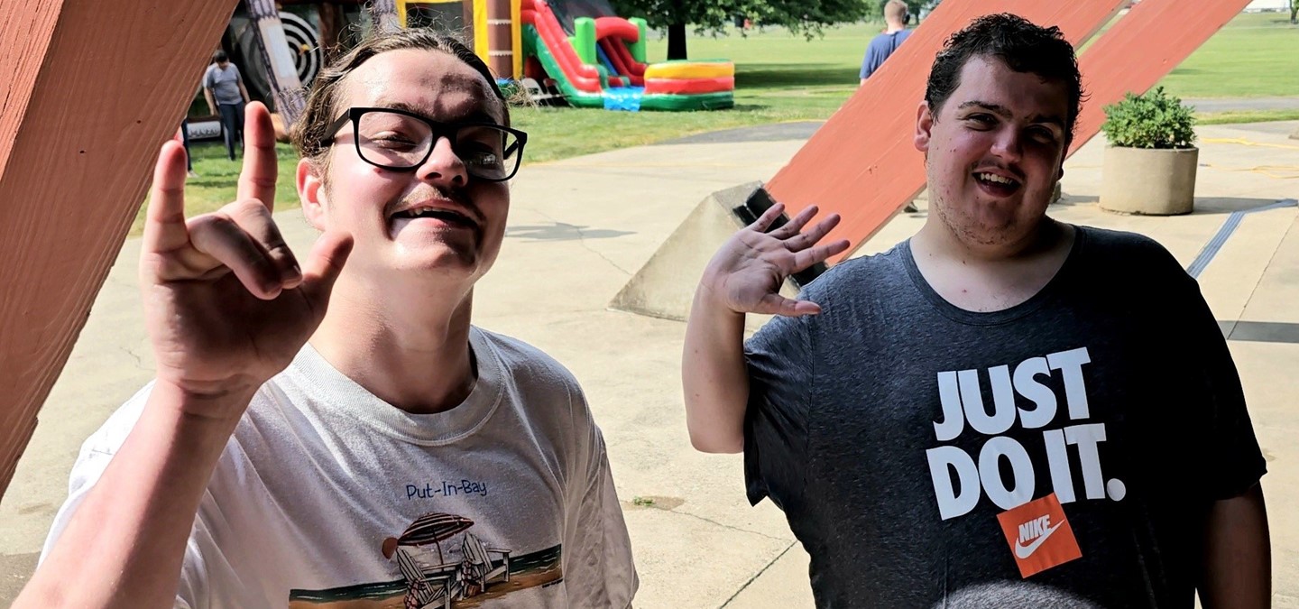 Vern Riffe School Students waving at the Annual Summer Cookout