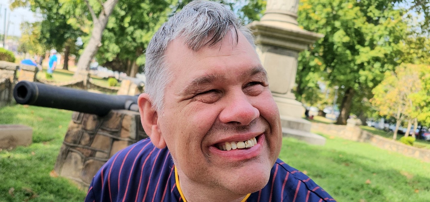 A man enjoying a beautiful late-summer day.
